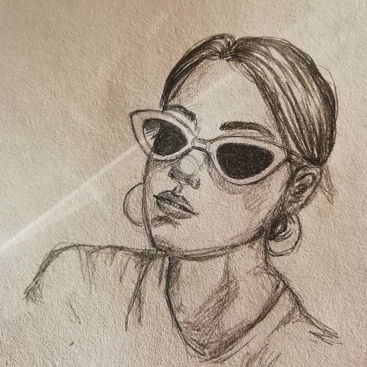 GIRL WEARING SUNGLASSES