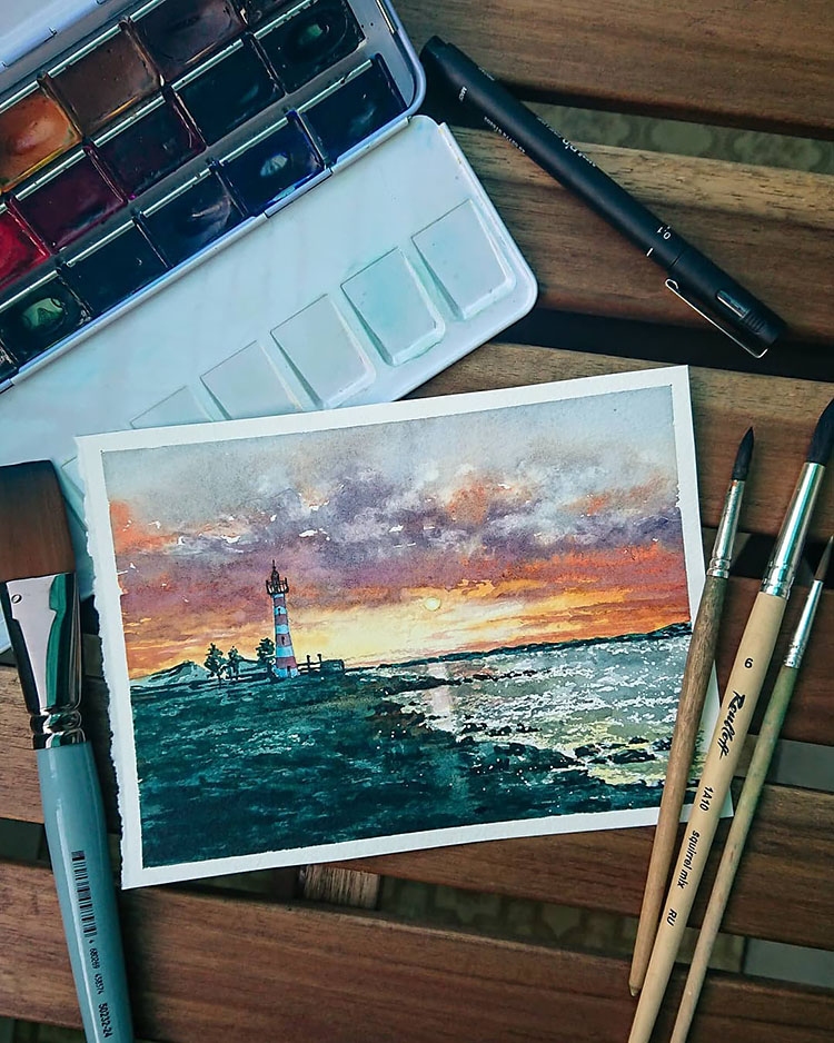 LIGHTHOUSE WITH SUNSET SKY