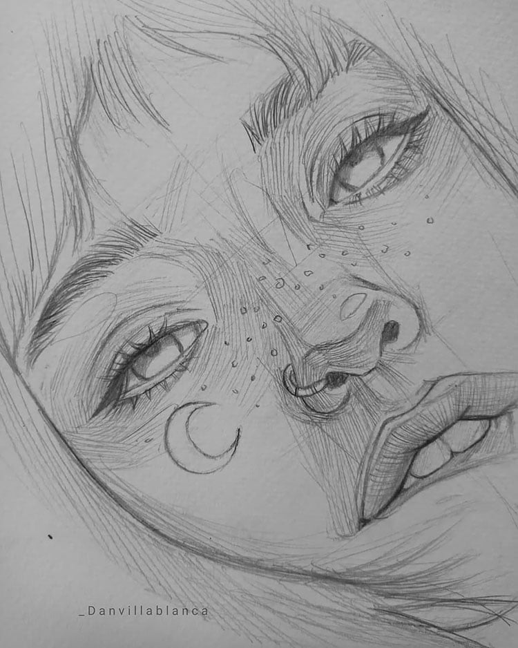 girl with freckles drawing