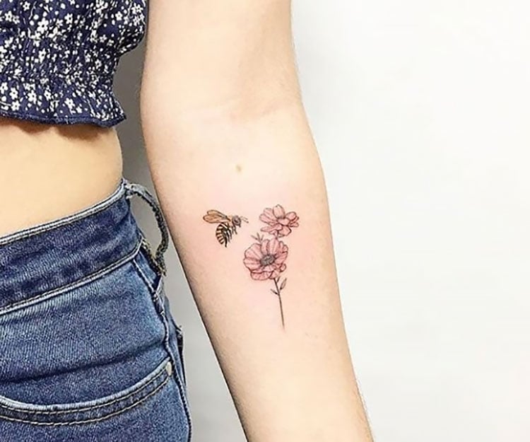 bee with flower on inner arm