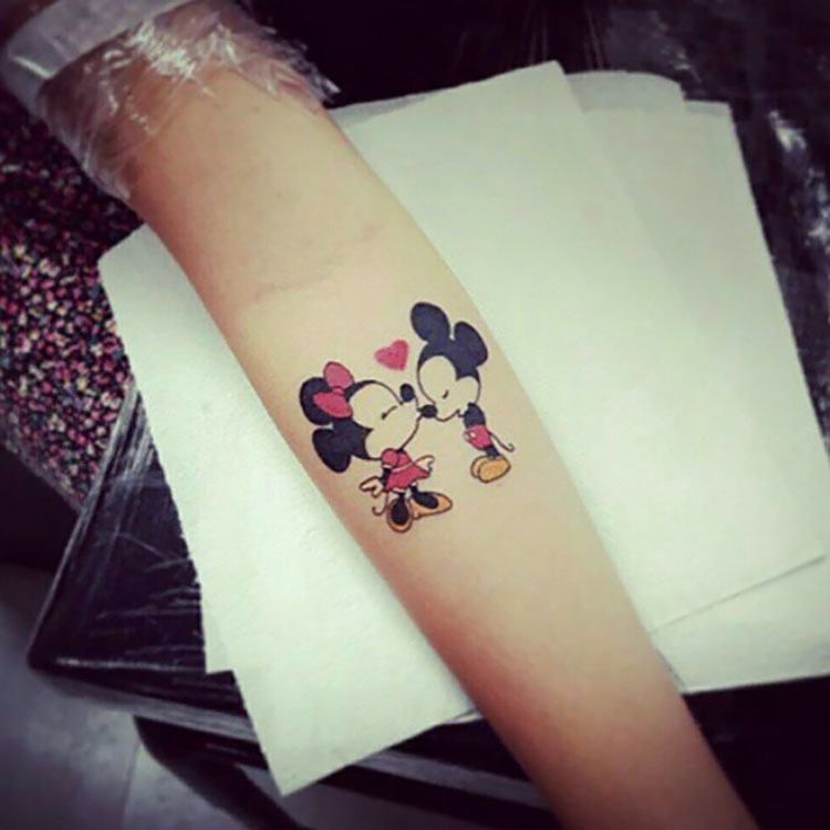 mickey and minnie tattoo on arm