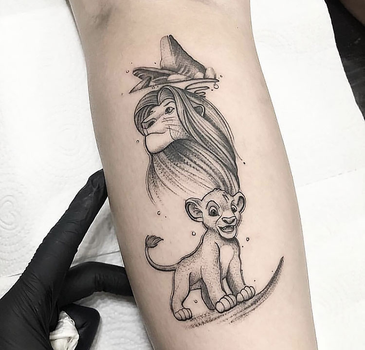 the lion king arm tattoo