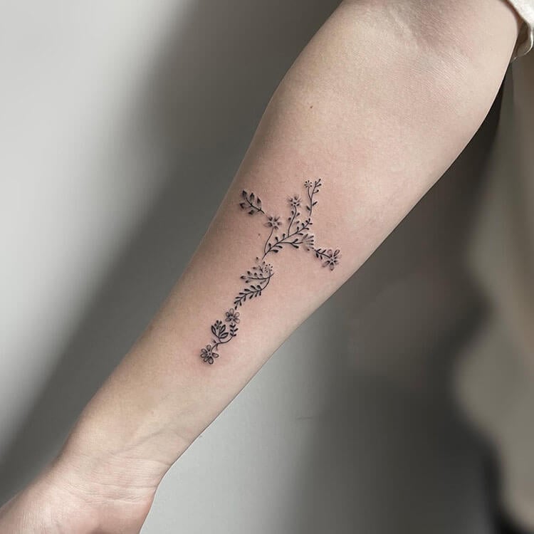 CryBaby Tattoo  Tiny cross with flowers done by  Facebook