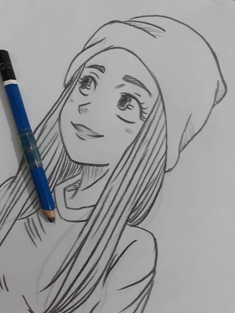 girl wearing beanie drawing