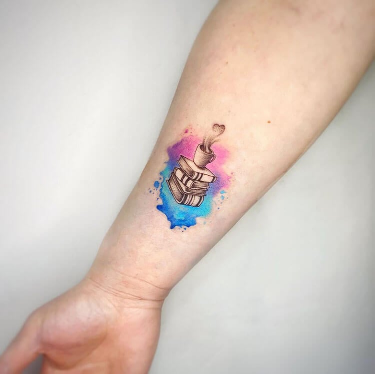 Watercolor book tattoo by Kaitlin Matthews cakelintattoos  Book tattoo  Bookish tattoos Nerdy tattoos