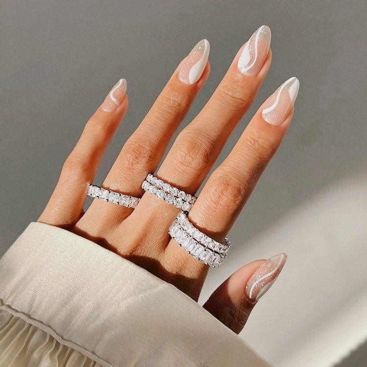 white nails with sparkles