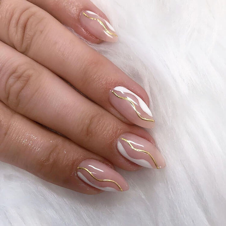 white and gold nails