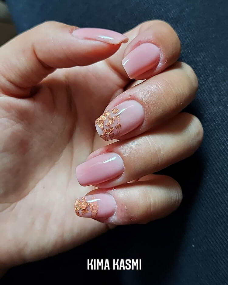 nude nails with gold flakes