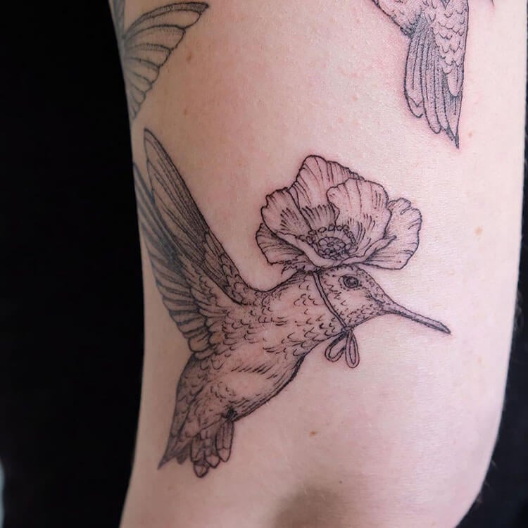 bird with flower tattoo