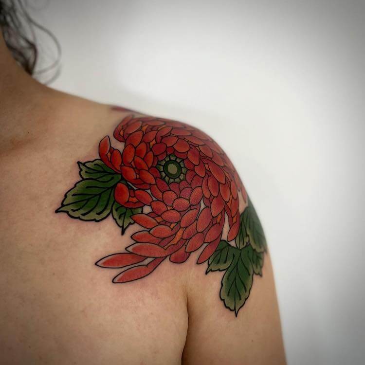 Chrysanthemum tattoo on the right shoulder