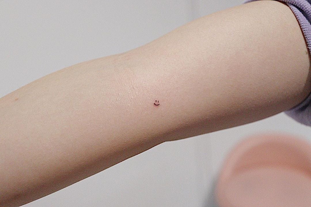 This smiley face tattoo is monitoring you - CNET