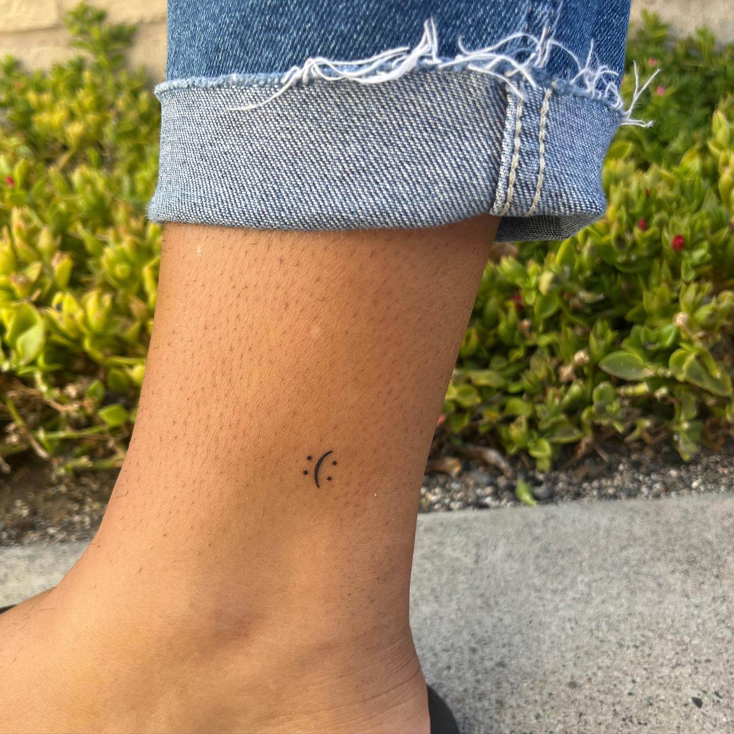 19 Cheerful Smiley Face Tattoo Designs  Moms Got the Stuff