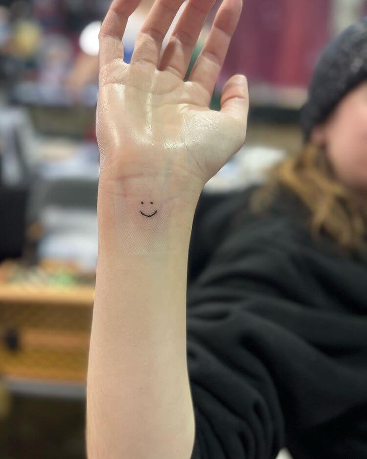 18 Cheerful Smiley Face Tattoo Designs  Moms Got the Stuff