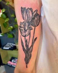 20 Beautiful Tulip Tattoo Ideas - Mom&rsquo;s Got the Stuff